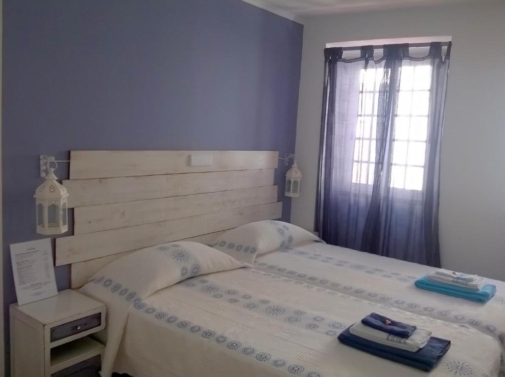 Postel nebo postele na pokoji v ubytování Casa BuonVento