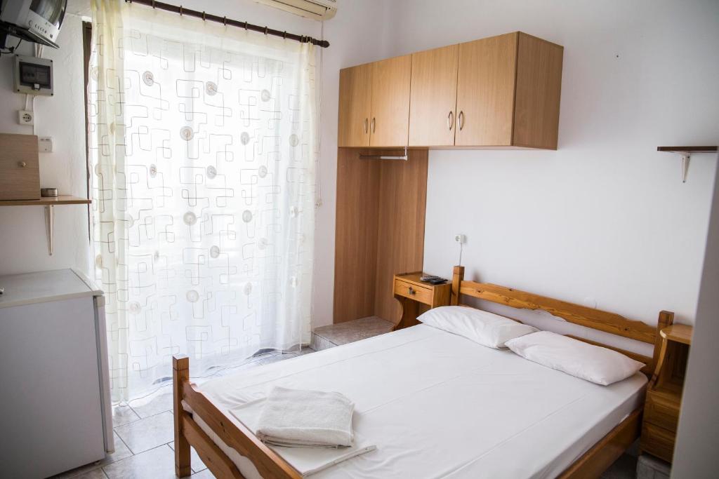 Voodi või voodid majutusasutuse Orfeas Rooms toas