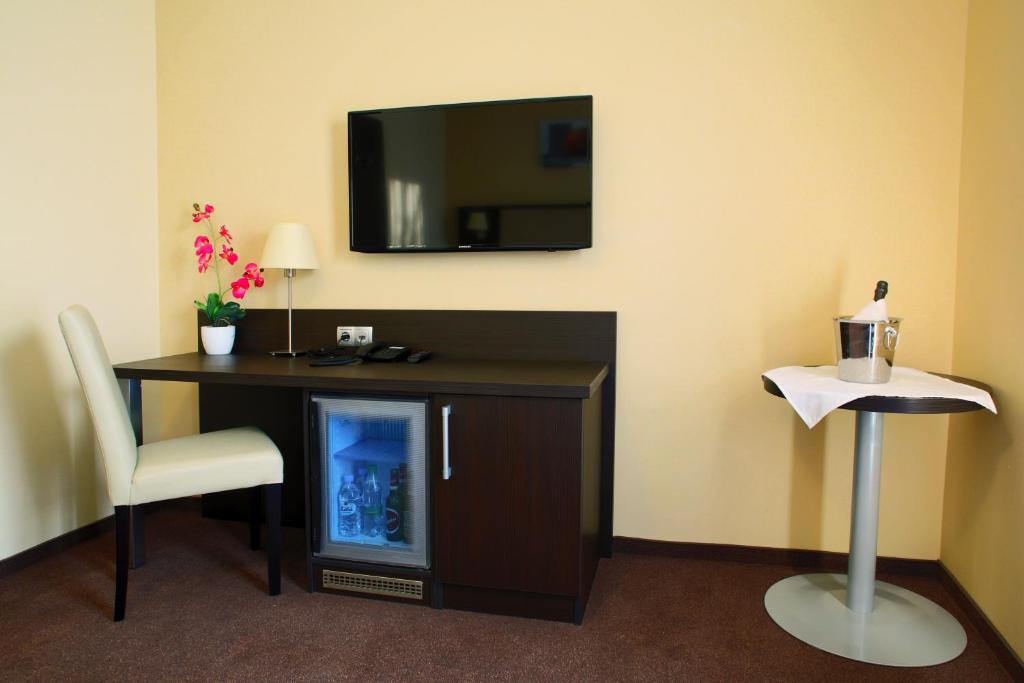 TV a/nebo společenská místnost v ubytování Casino & Hotel ADMIRAL Ptuj