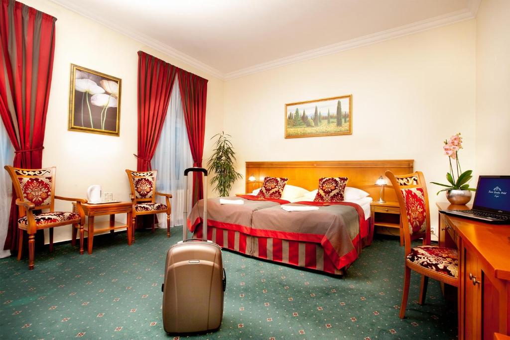 Postel nebo postele na pokoji v ubytování Green Garden Hotel