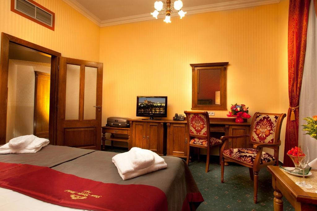 Postel nebo postele na pokoji v ubytování Green Garden Hotel
