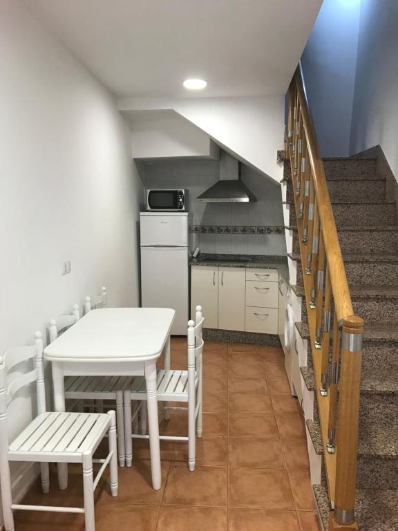 A kitchen or kitchenette at Apartamentos San Guillermo