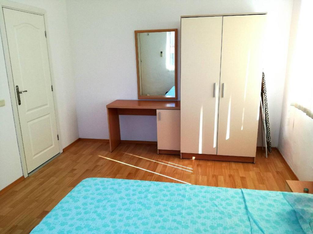 Postel nebo postele na pokoji v ubytování Apartment Stoyanovi
