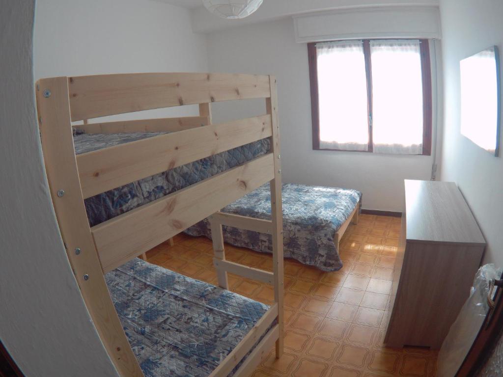 Postel nebo postele na pokoji v ubytování Gli Ulivi di Nesso