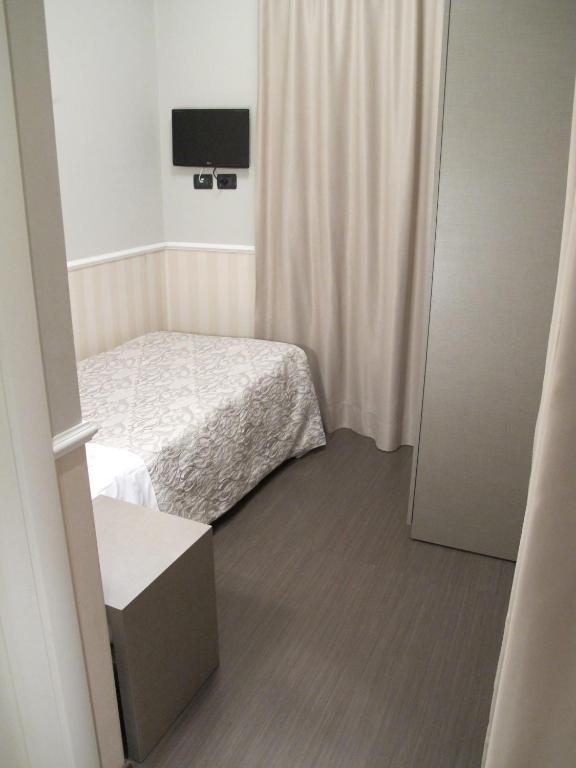 Postel nebo postele na pokoji v ubytování Hotel Laguna Residence