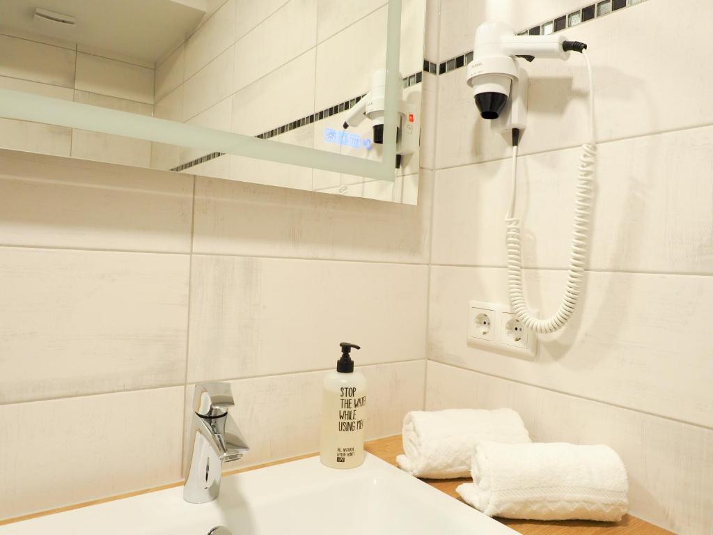 Koupelna v ubytování Wein Erlebnis Hotel Maimühle