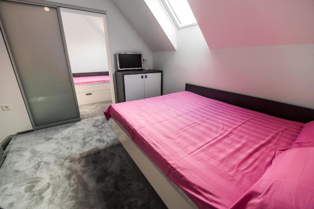 Postel nebo postele na pokoji v ubytování Golf apartment with SPA tickets discount