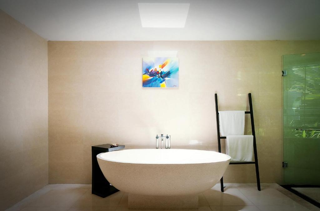 Un baño de Kebun Villas & Resort
