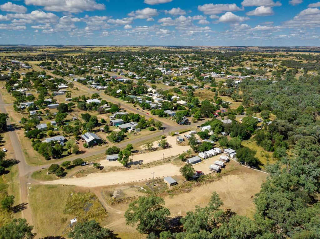 an aerial view of a small town with many tents at Taroom Caravan & Tourist Park in Taroom