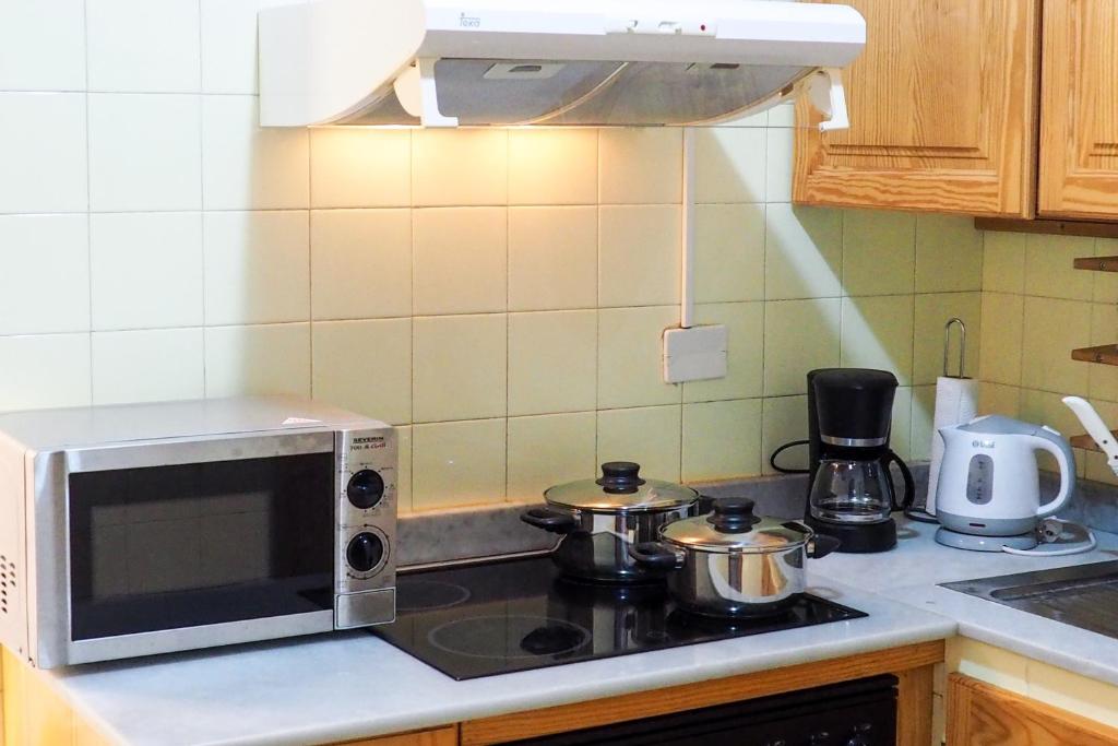 Kuchyň nebo kuchyňský kout v ubytování Casa PALMAROSA