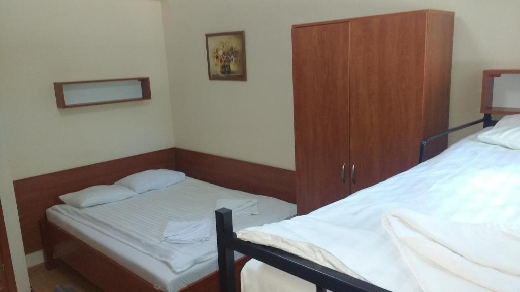 Posteľ alebo postele v izbe v ubytovaní Willa Marina Widzew