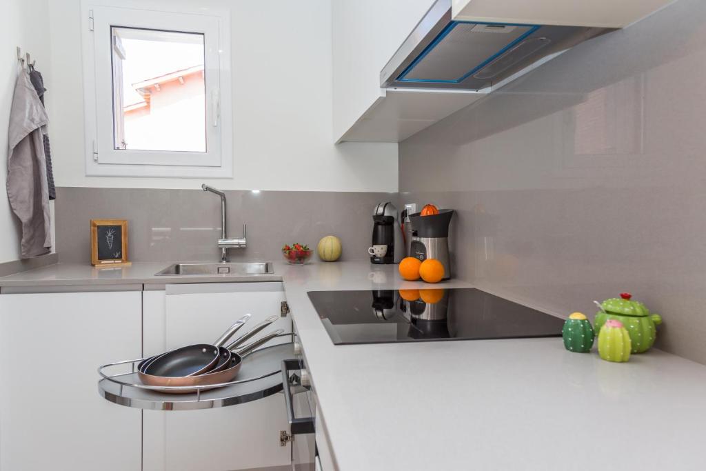 Kuchyň nebo kuchyňský kout v ubytování Rambla de Marisol Apartments