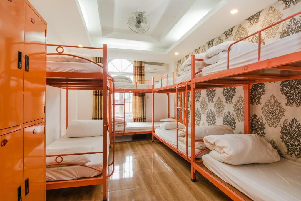 a room with a bunch of bunk beds at Hanoi Central Backpackers Hostel in Hanoi