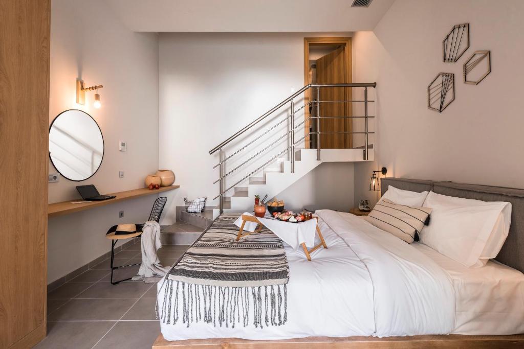 Postel nebo postele na pokoji v ubytování Villa Di Mare Seaside Suites