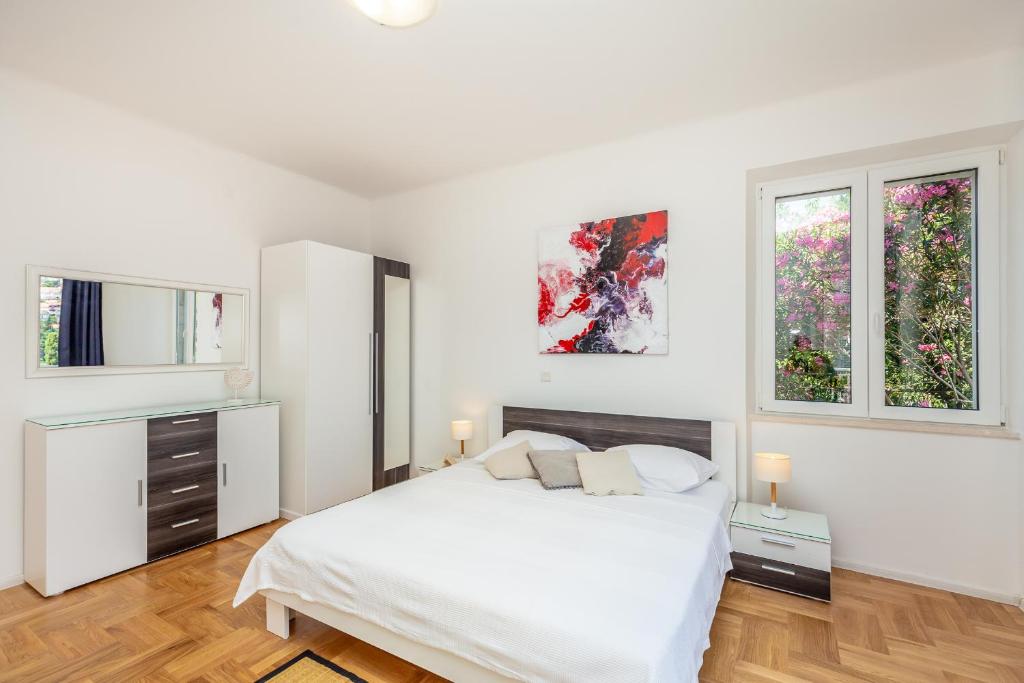 Posteľ alebo postele v izbe v ubytovaní Downtown Serenity House
