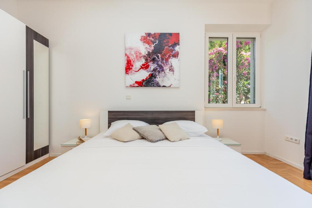 Posteľ alebo postele v izbe v ubytovaní Downtown Serenity House
