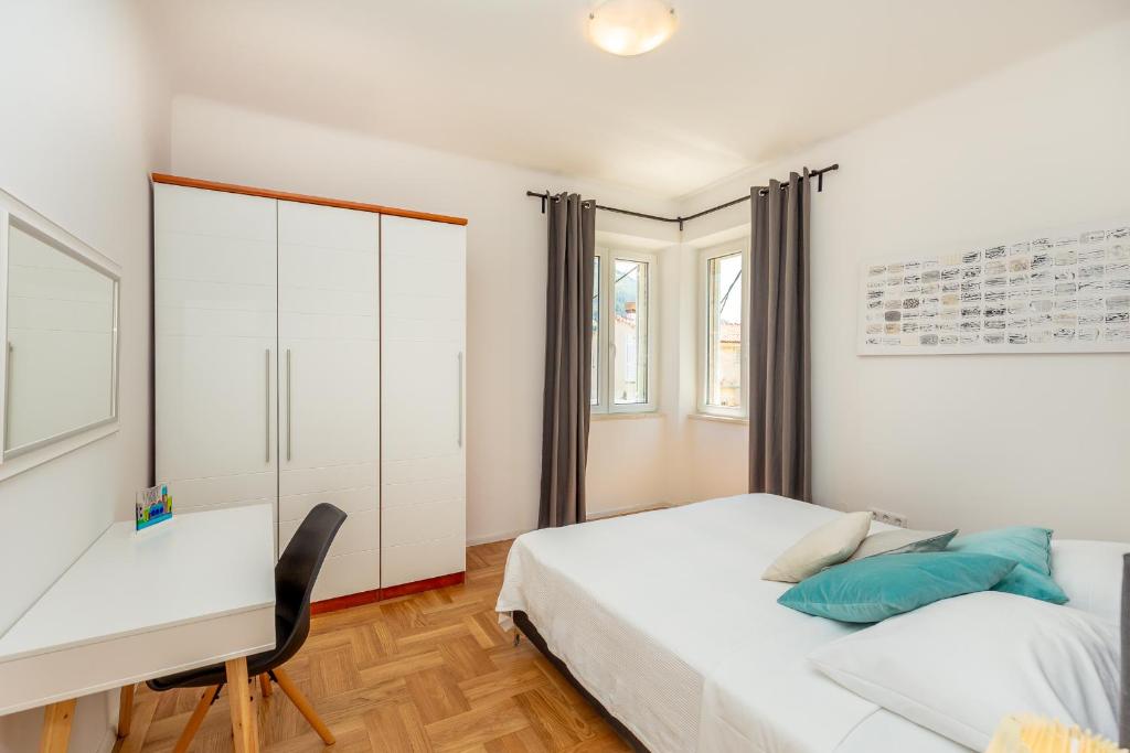 Posteľ alebo postele v izbe v ubytovaní Downtown Serenity House