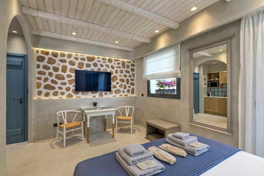 Posteľ alebo postele v izbe v ubytovaní Estia Boutique Apartments