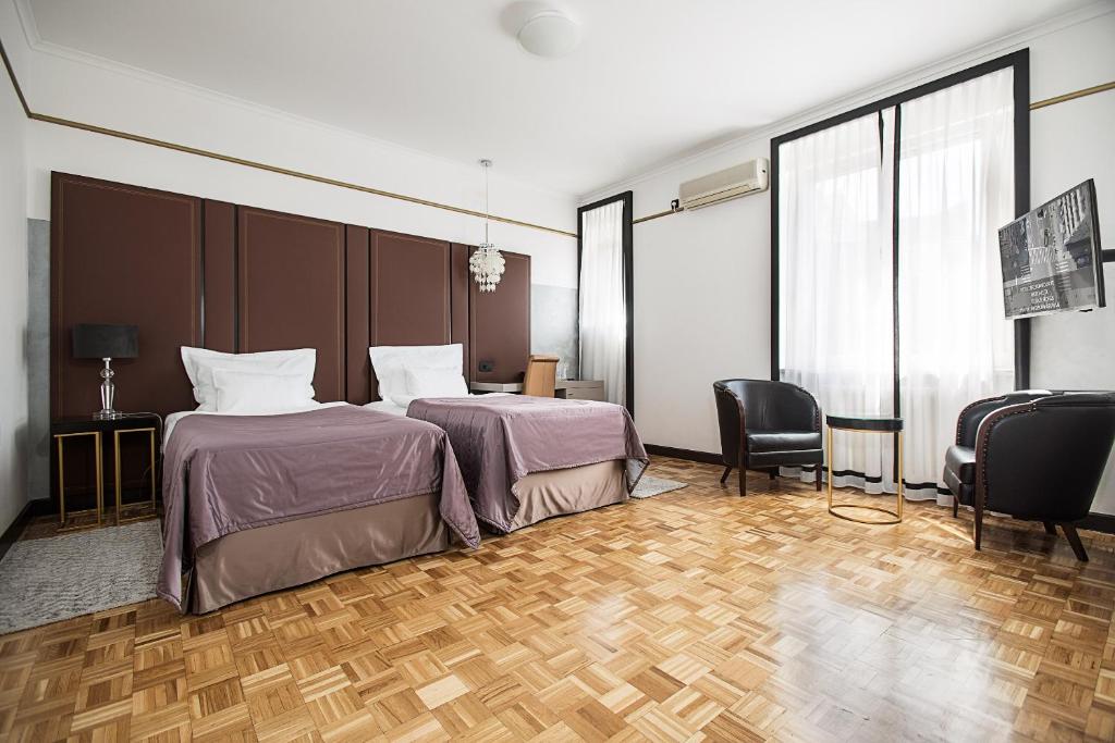 Krevet ili kreveti u jedinici u okviru objekta Hotel Majestic