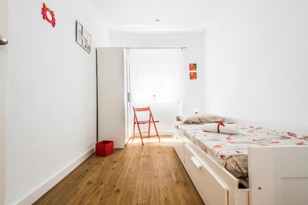 Posteľ alebo postele v izbe v ubytovaní El Coral Apartment Valencia