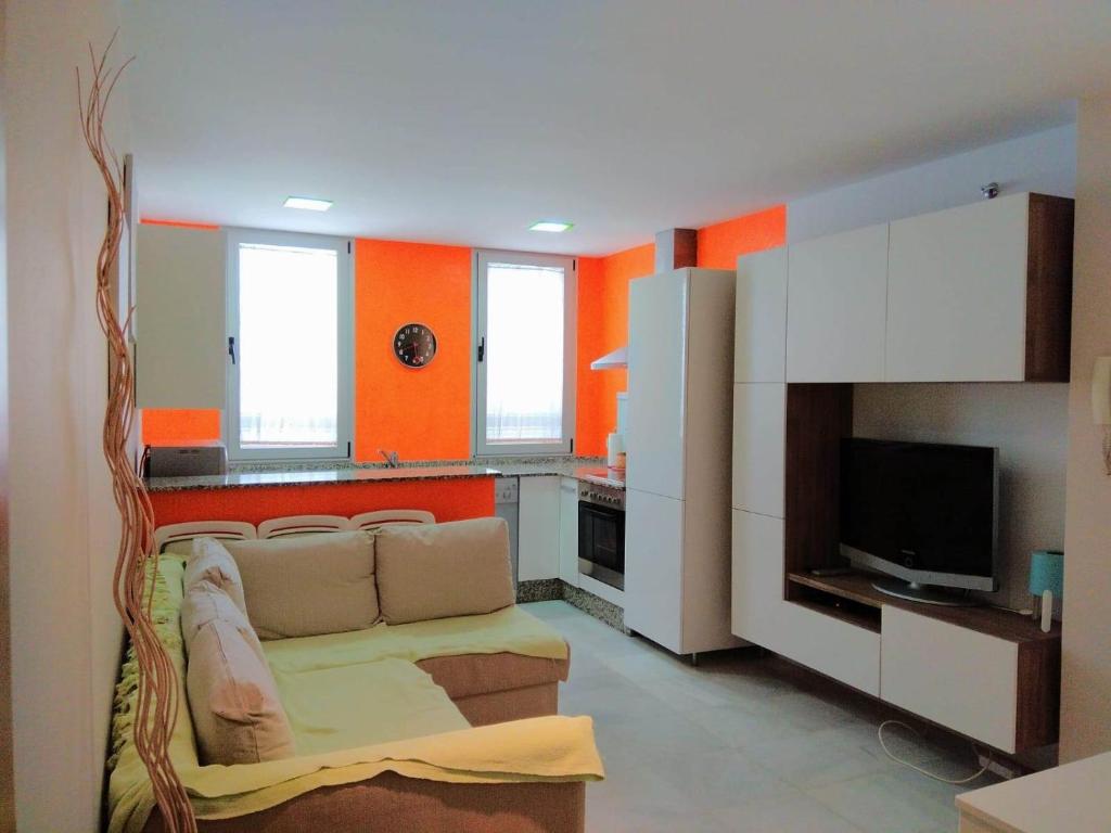 TV a/nebo společenská místnost v ubytování Apartamento Trafalgar