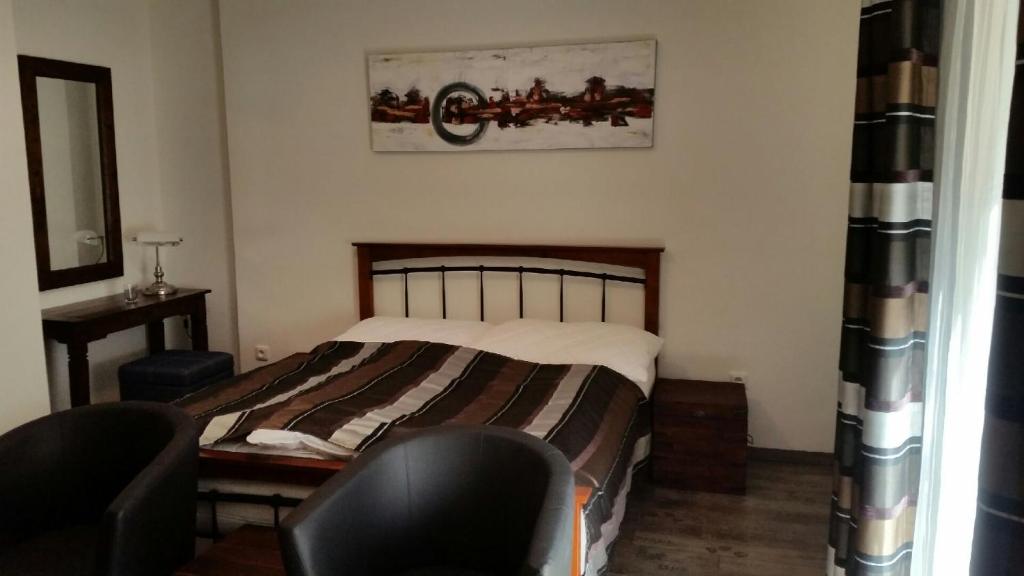 Postel nebo postele na pokoji v ubytování Sommelierka