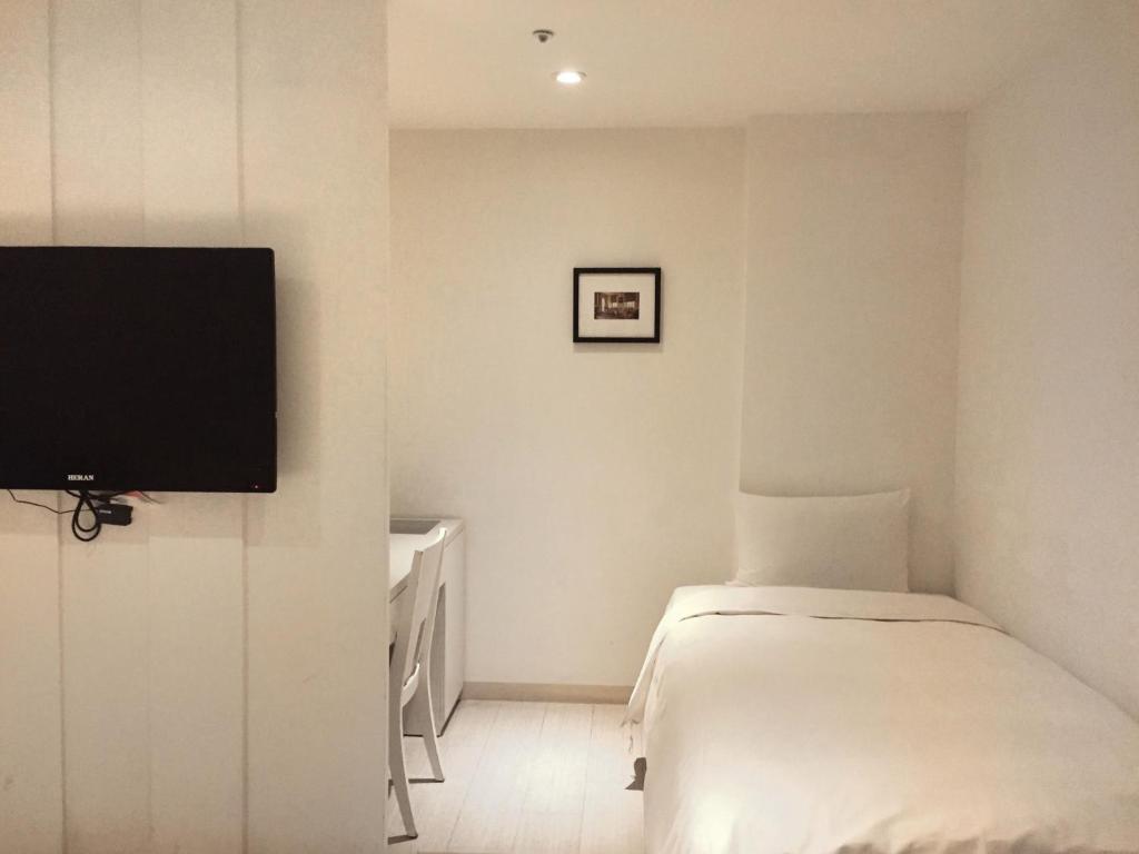 TV a/nebo společenská místnost v ubytování Wemeet Hotel Taipei