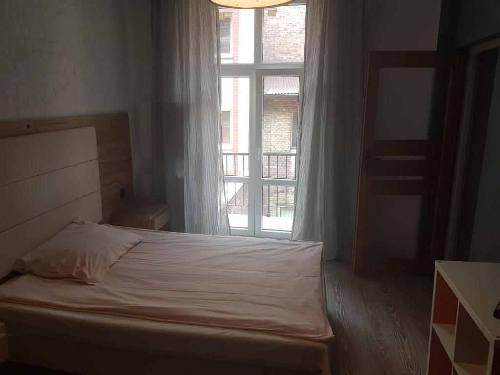Postel nebo postele na pokoji v ubytování Kaktus Guest House