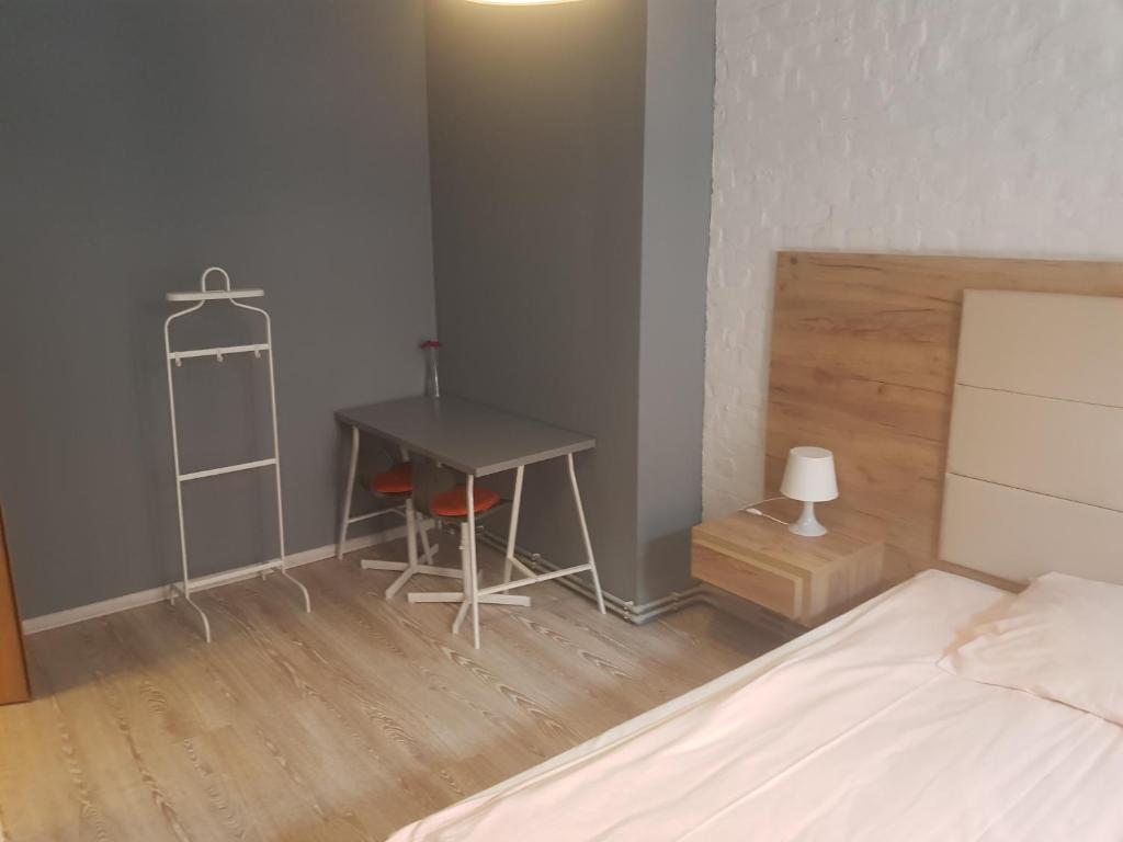 Postel nebo postele na pokoji v ubytování Kaktus Guest House