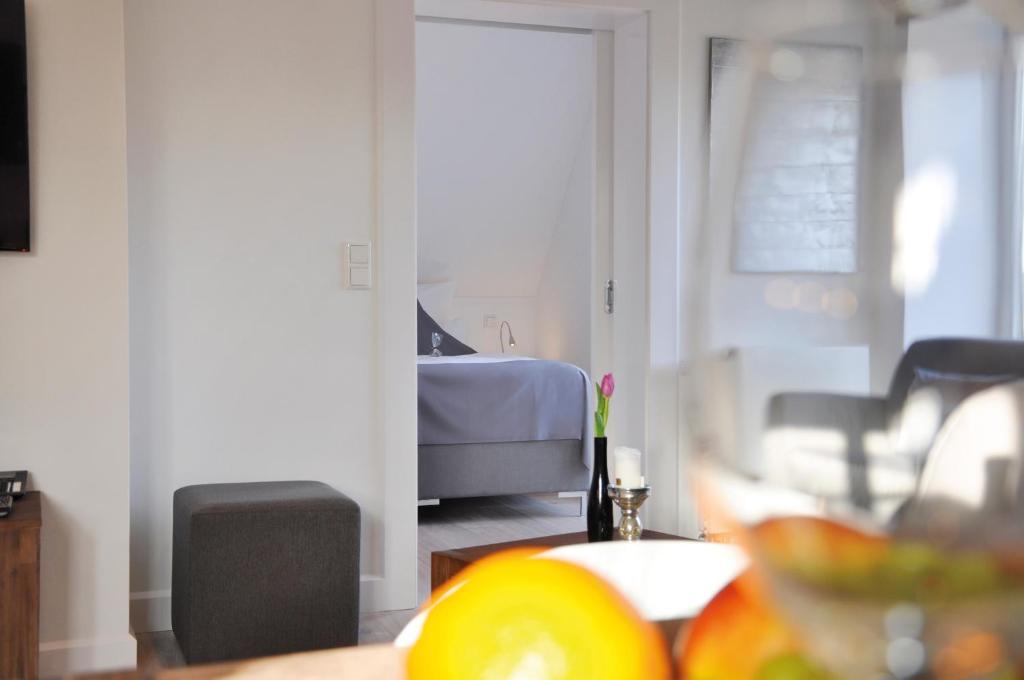 Posezení v ubytování Rackmers Hof - Suiten Hotel garni mit Sauna