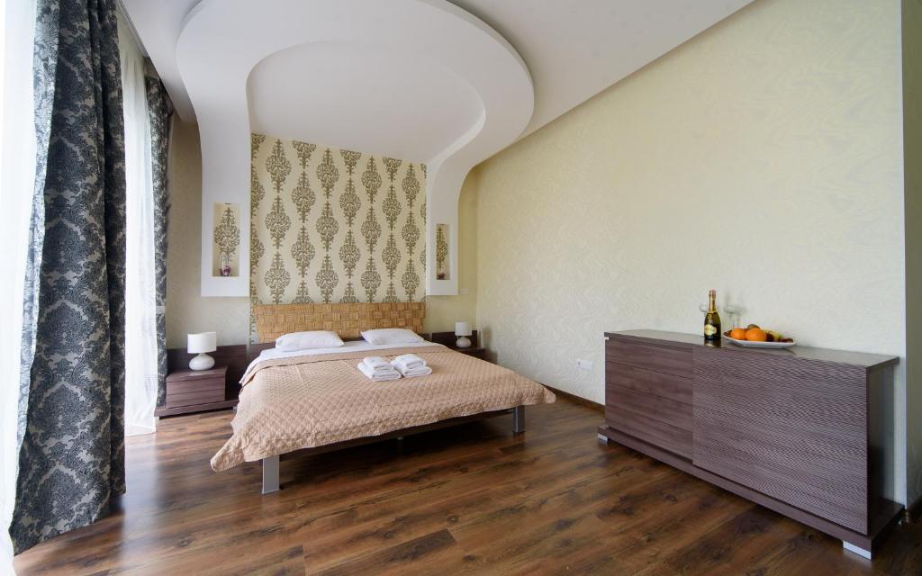 Postel nebo postele na pokoji v ubytování Hotel Fusion
