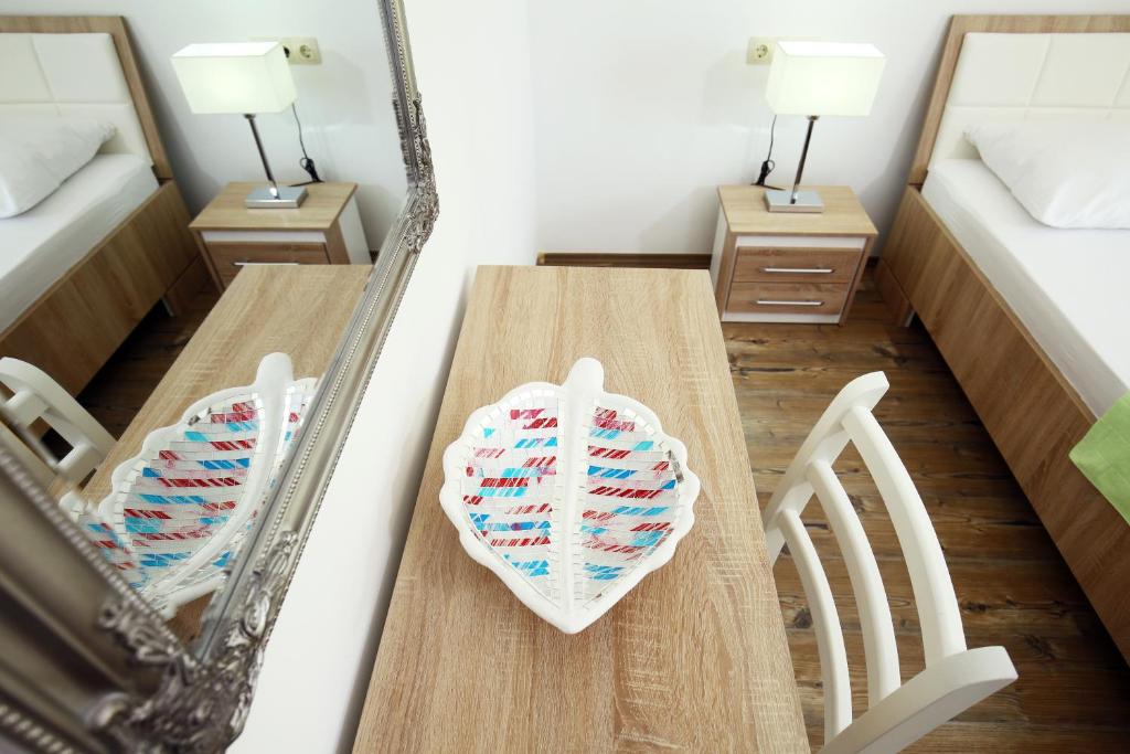 Posteľ alebo postele v izbe v ubytovaní Apartments Nemira Exclusive