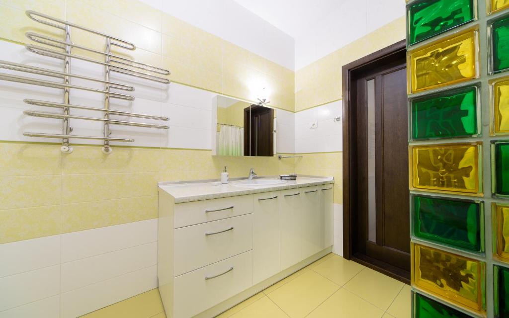 Kuchyň nebo kuchyňský kout v ubytování Hotel Fusion