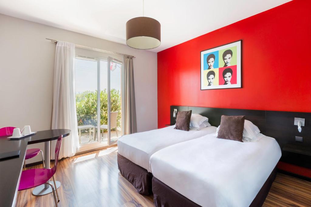 Postel nebo postele na pokoji v ubytování Best Western Park Hotel Geneve-Thoiry