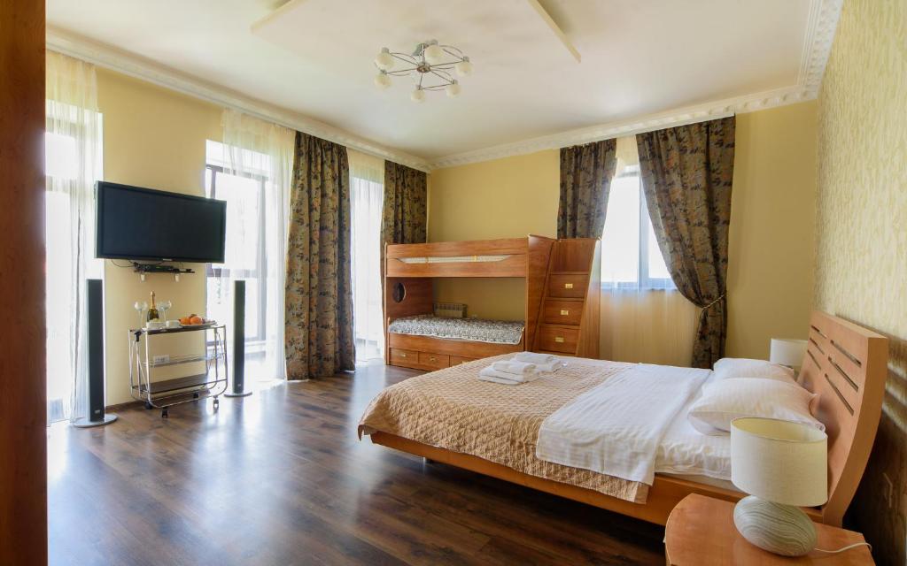 Postel nebo postele na pokoji v ubytování Hotel Fusion