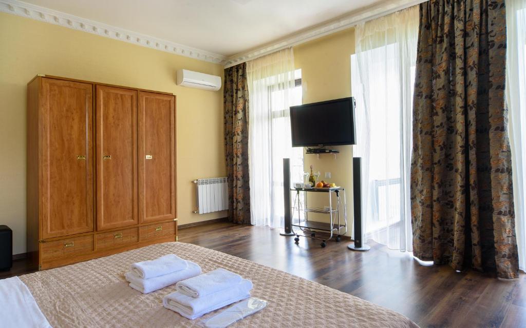 Postel nebo postele na pokoji v ubytování Hotel Fusion