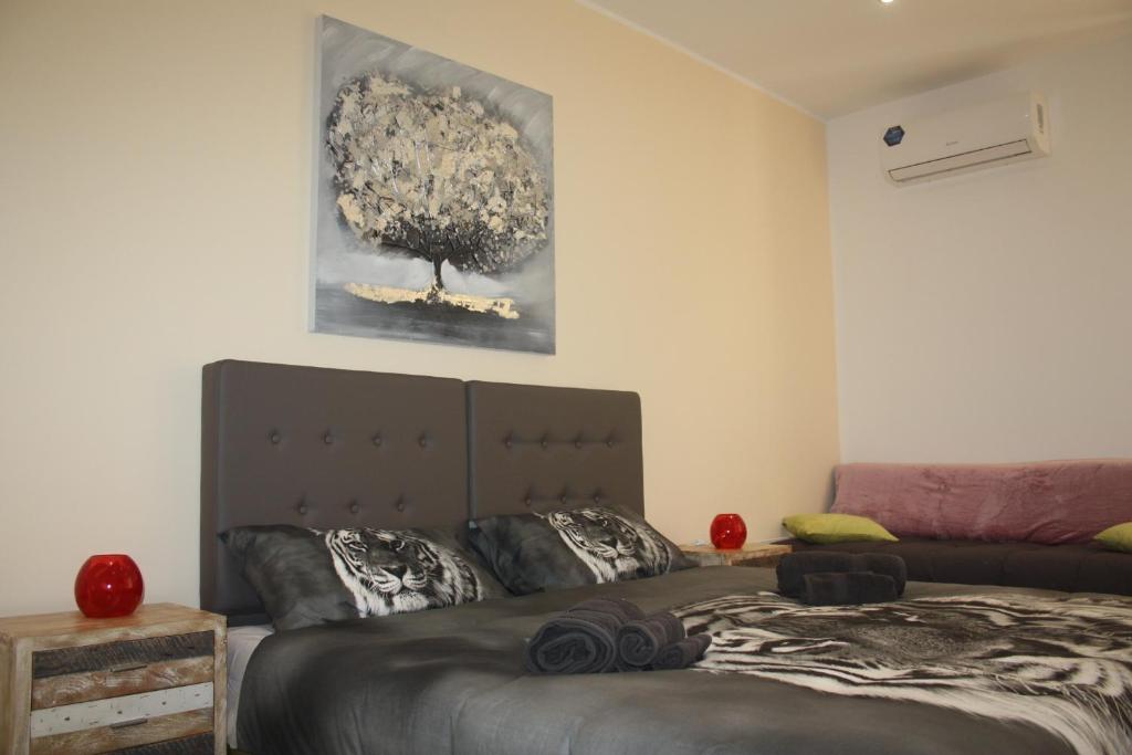 Postel nebo postele na pokoji v ubytování B&B Epipoli