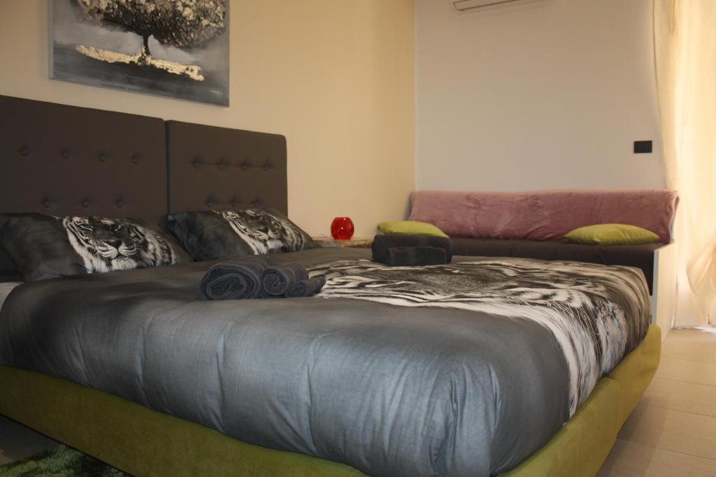 Postel nebo postele na pokoji v ubytování B&B Epipoli