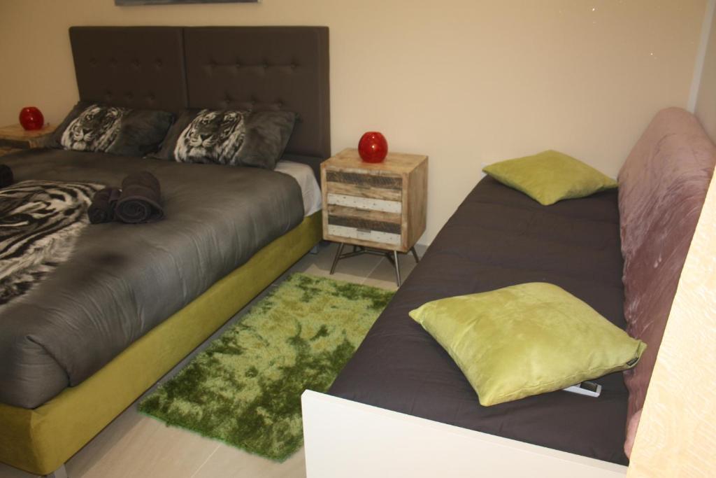 Postel nebo postele na pokoji v ubytování B&B Epipoli