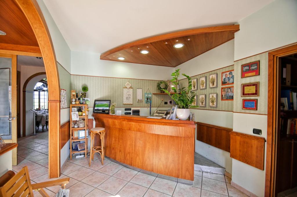 Kuchyň nebo kuchyňský kout v ubytování Albergo La Veranda