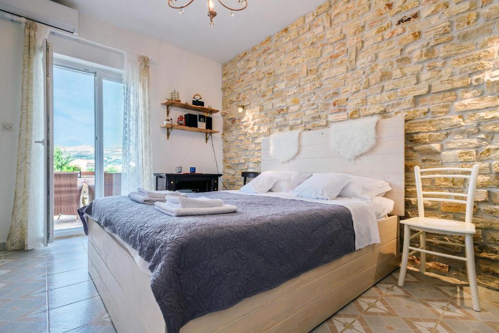 Posteľ alebo postele v izbe v ubytovaní Apartments Rija