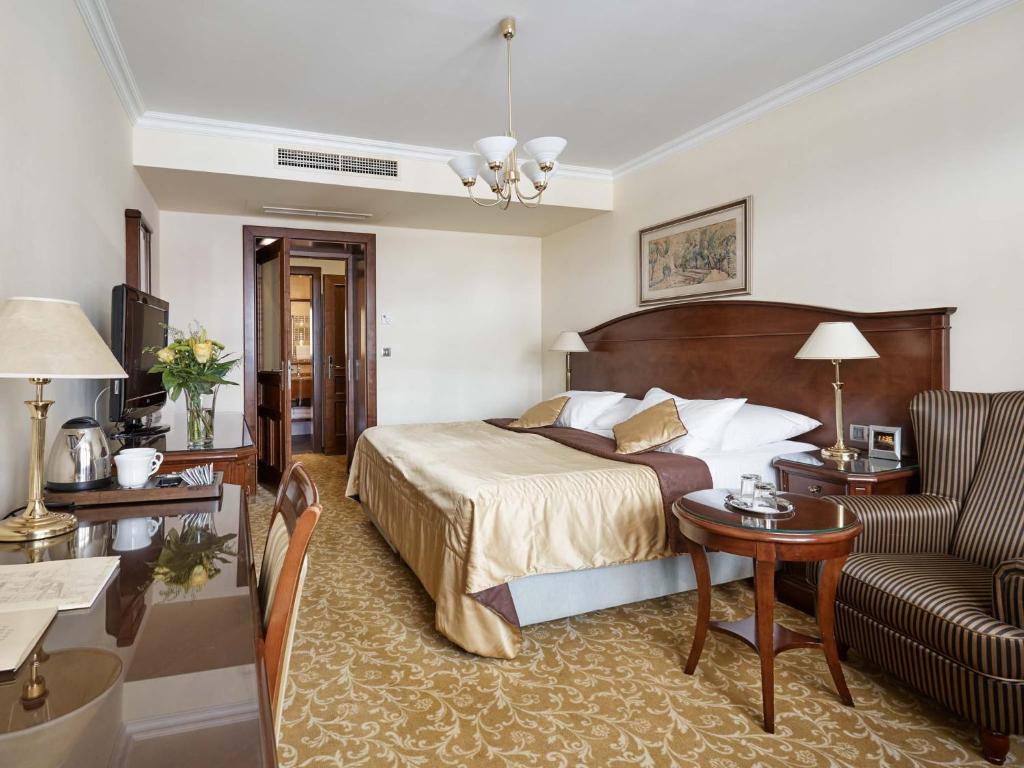 Voodi või voodid majutusasutuse Hotel Romance toas