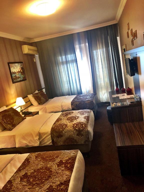 Family Resort Hotel - Deluxe Triple Room With Sea View