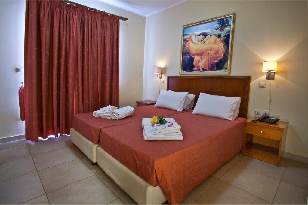 Postel nebo postele na pokoji v ubytování Hotel Cristina Maris