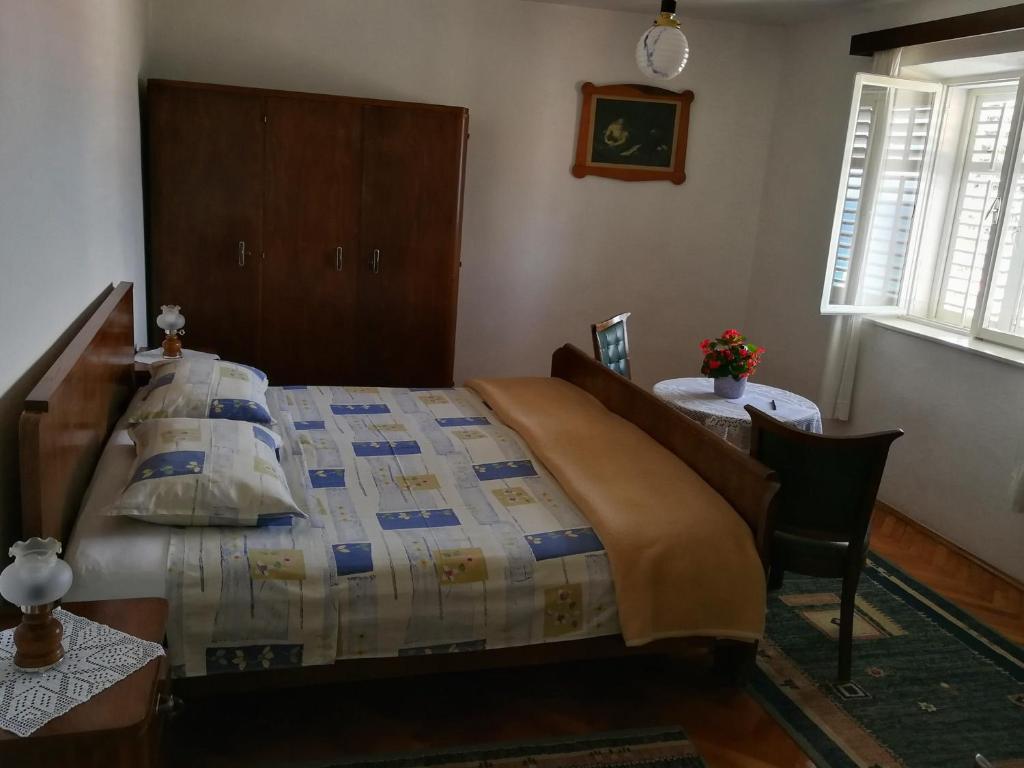 Postel nebo postele na pokoji v ubytování Guesthouse Lidija