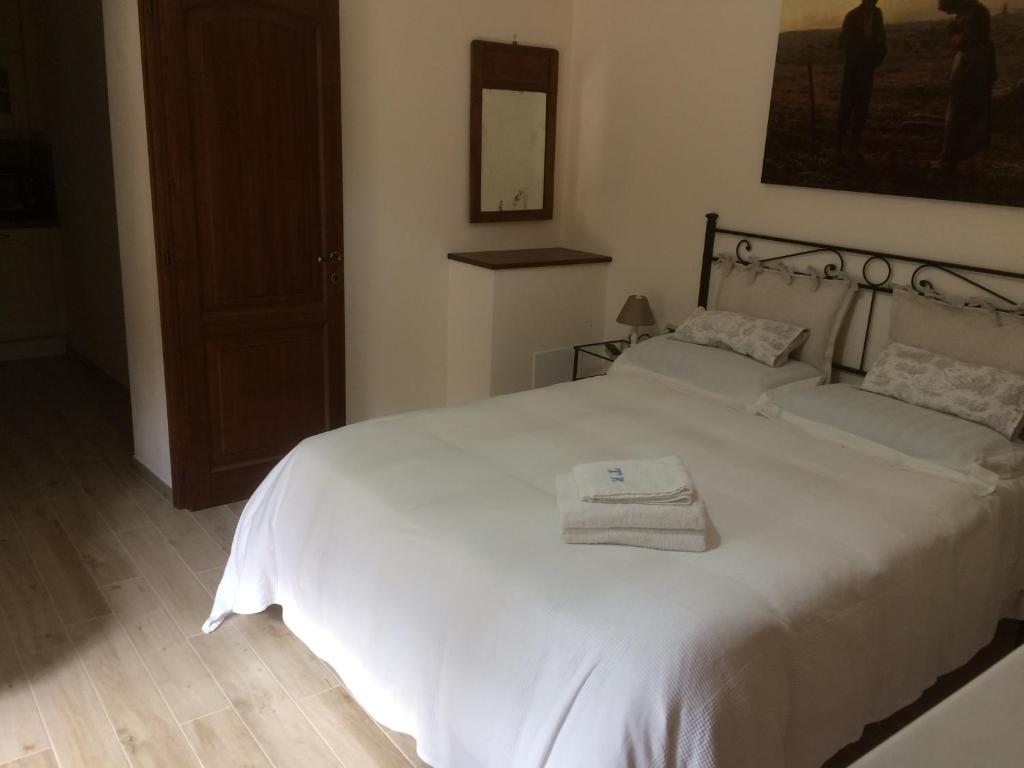 Posteľ alebo postele v izbe v ubytovaní Agriturismo Terrarossa