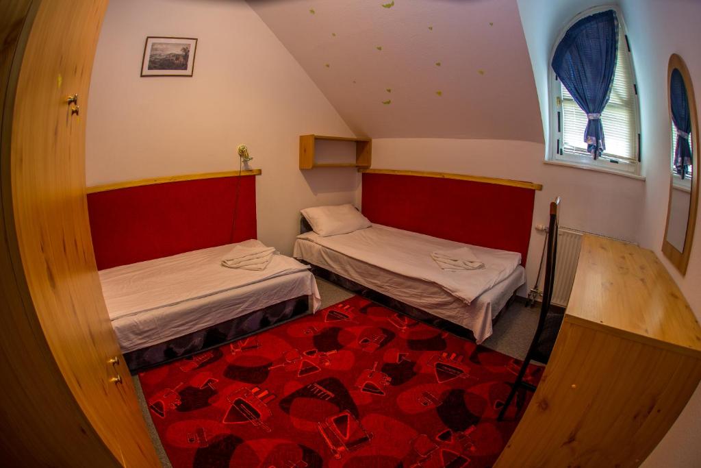 Posteľ alebo postele v izbe v ubytovaní Aqua Line Apartmanház