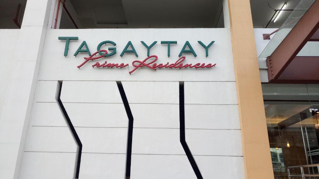 a sign for a tashkay firmolis at HappyNest 1857 @ Cityland Tagaytay in Tagaytay