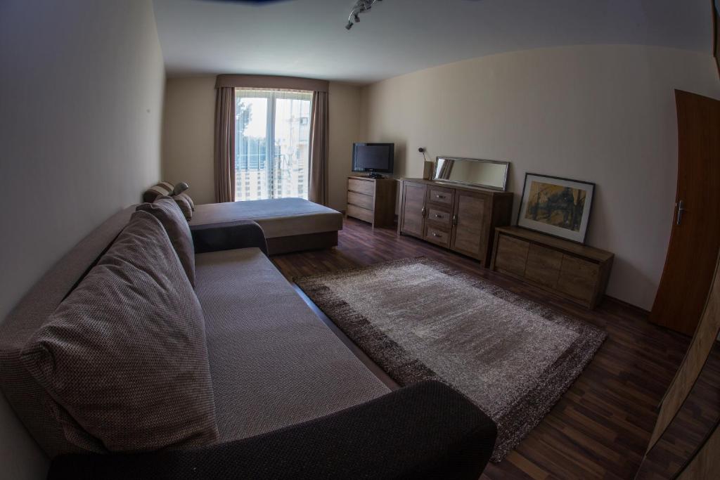 Posteľ alebo postele v izbe v ubytovaní Aqua Line Apartmanház