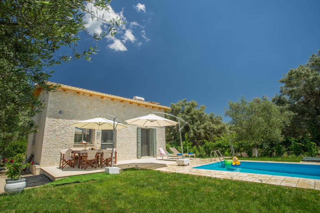 The swimming pool at or close to Alexandros Stone House